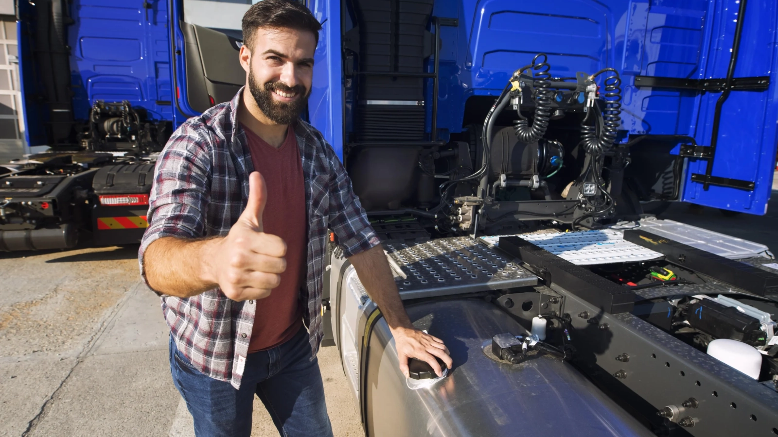 Mechanic doing Truck Preventive Maintenance Checks